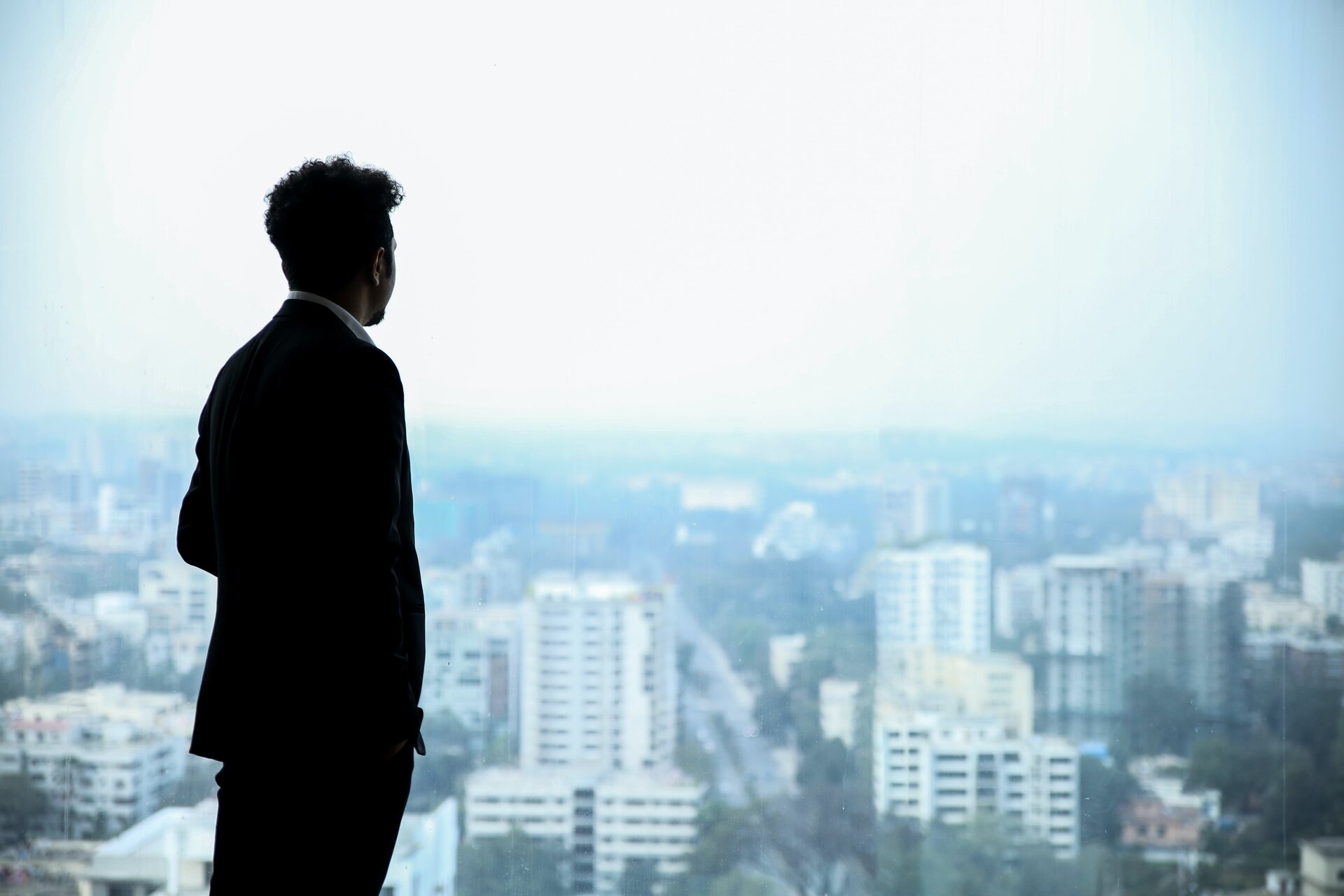 Business man overlooking the city